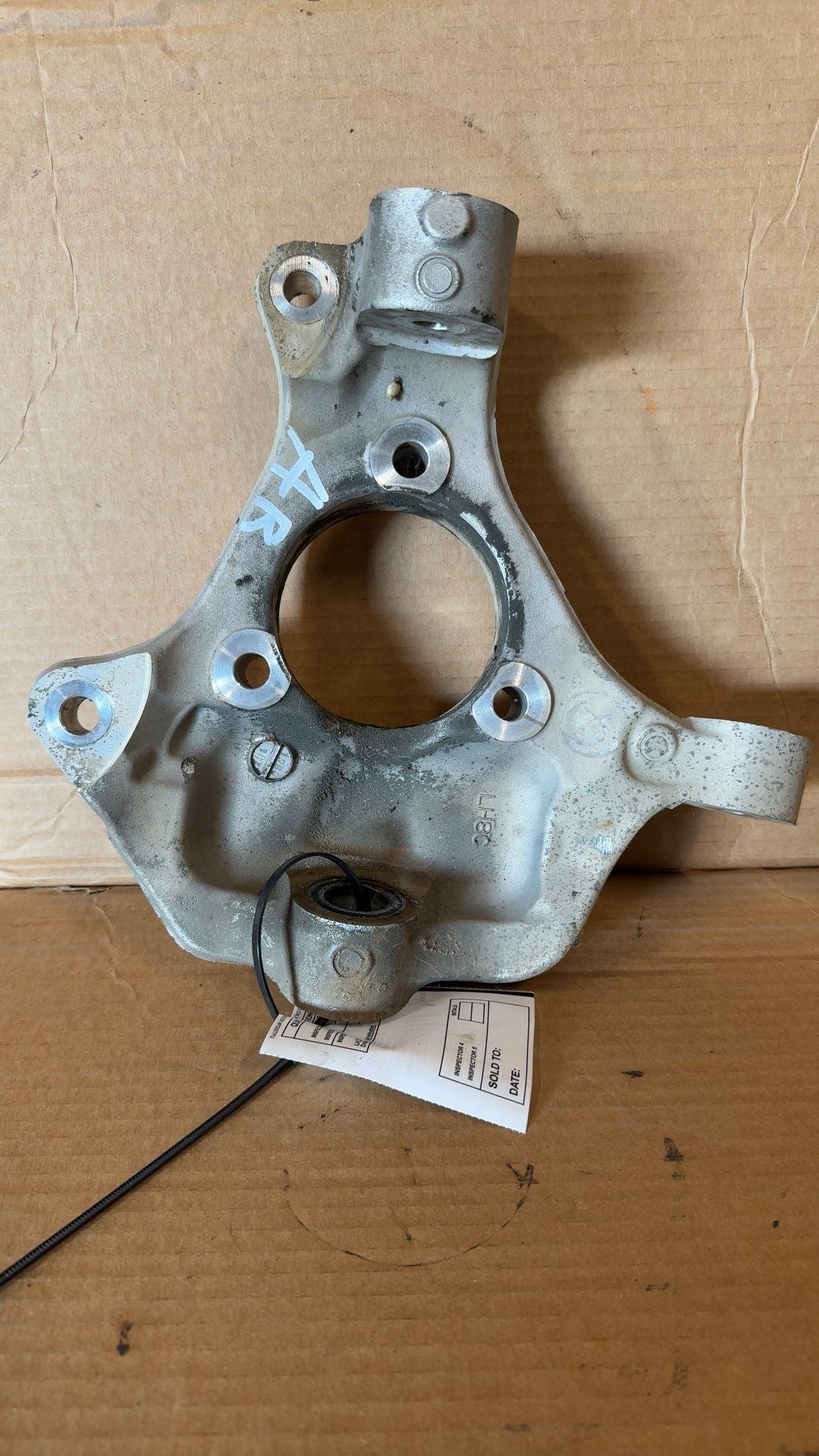 Spindle Knuckle from a 2019 Chevrolet Tahoe, front, left side, photo 1
