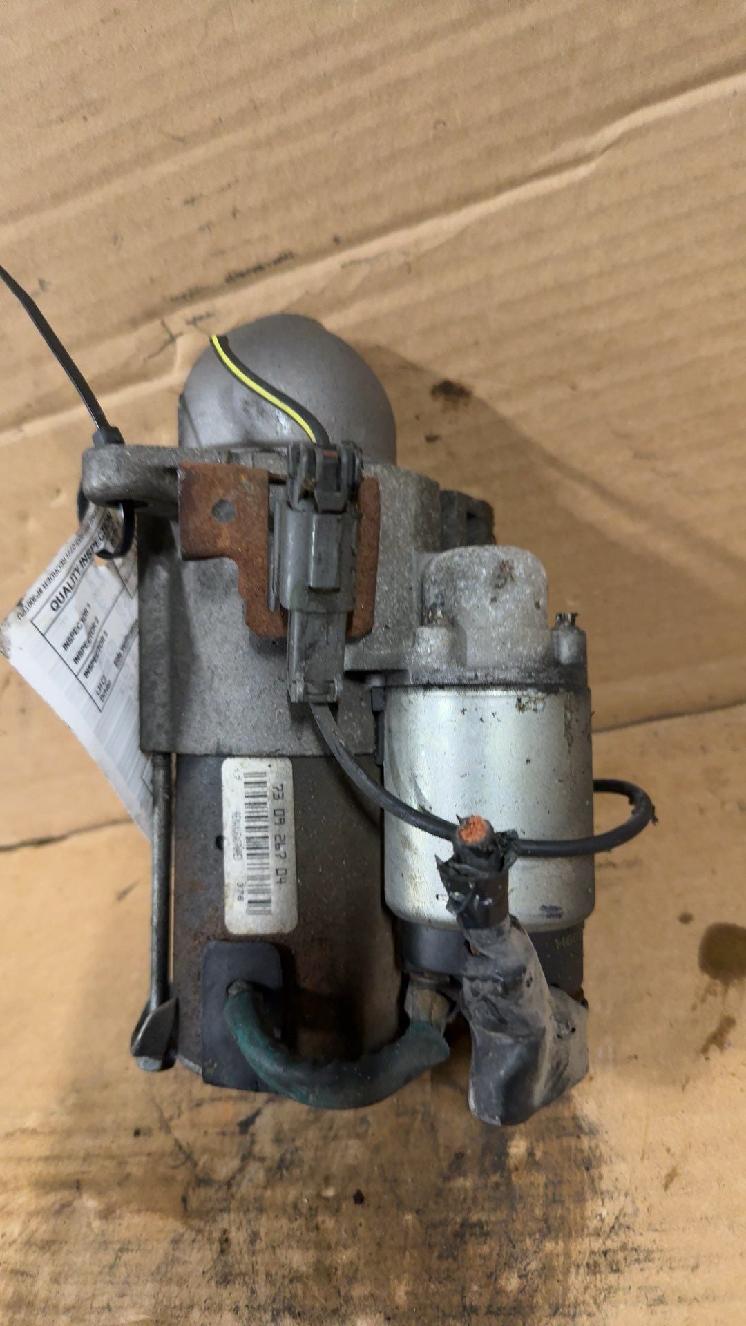 Starter Motor from a 2005 Nissan Sentra, photo 1