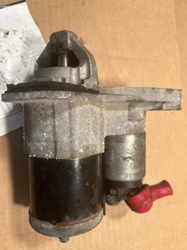 Starter Motor from a 2012 Nissan Versa, photo 1
