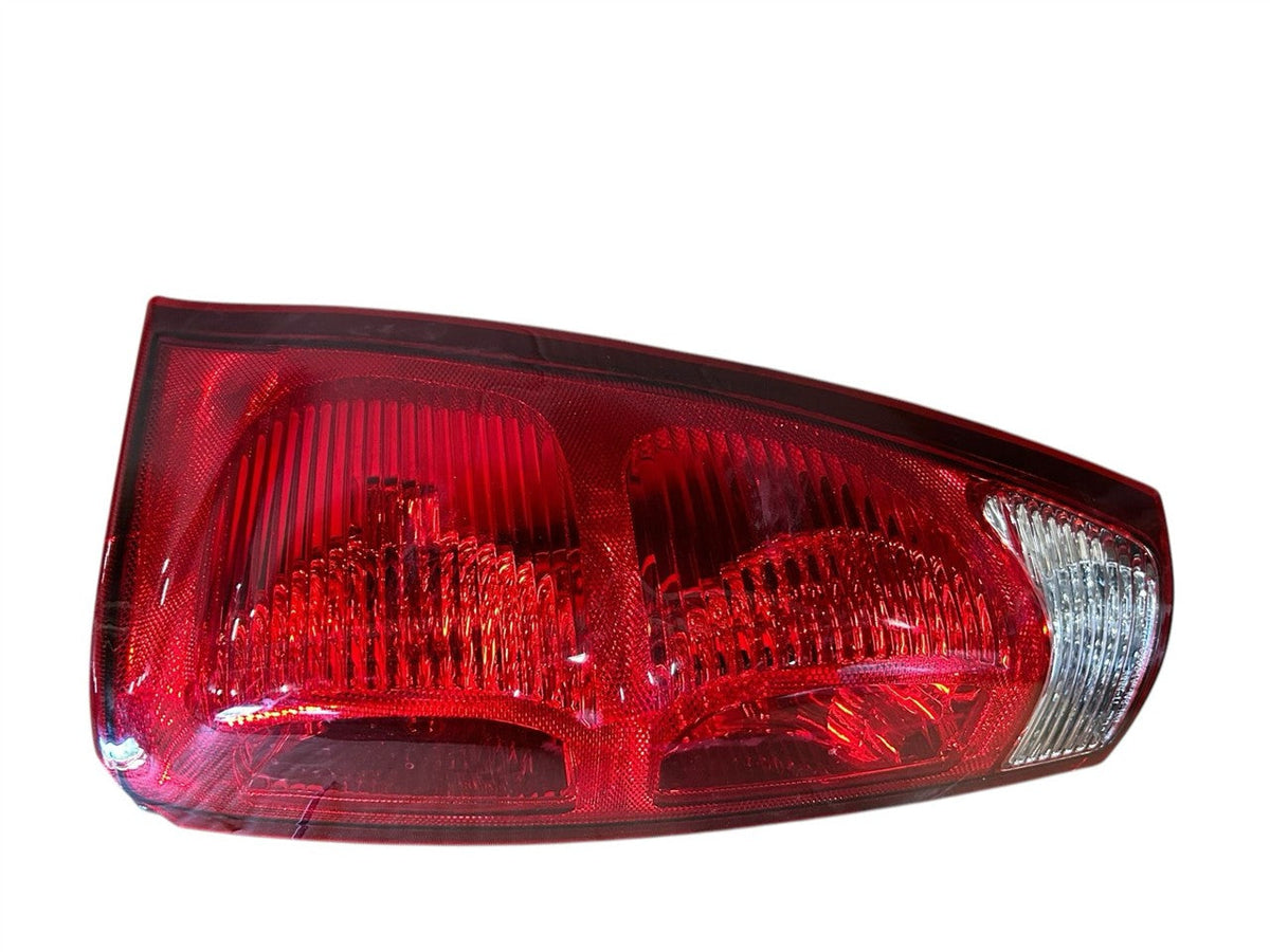Tail Light from a 2004 Chevrolet Avalanche 1500, right side, photo 2