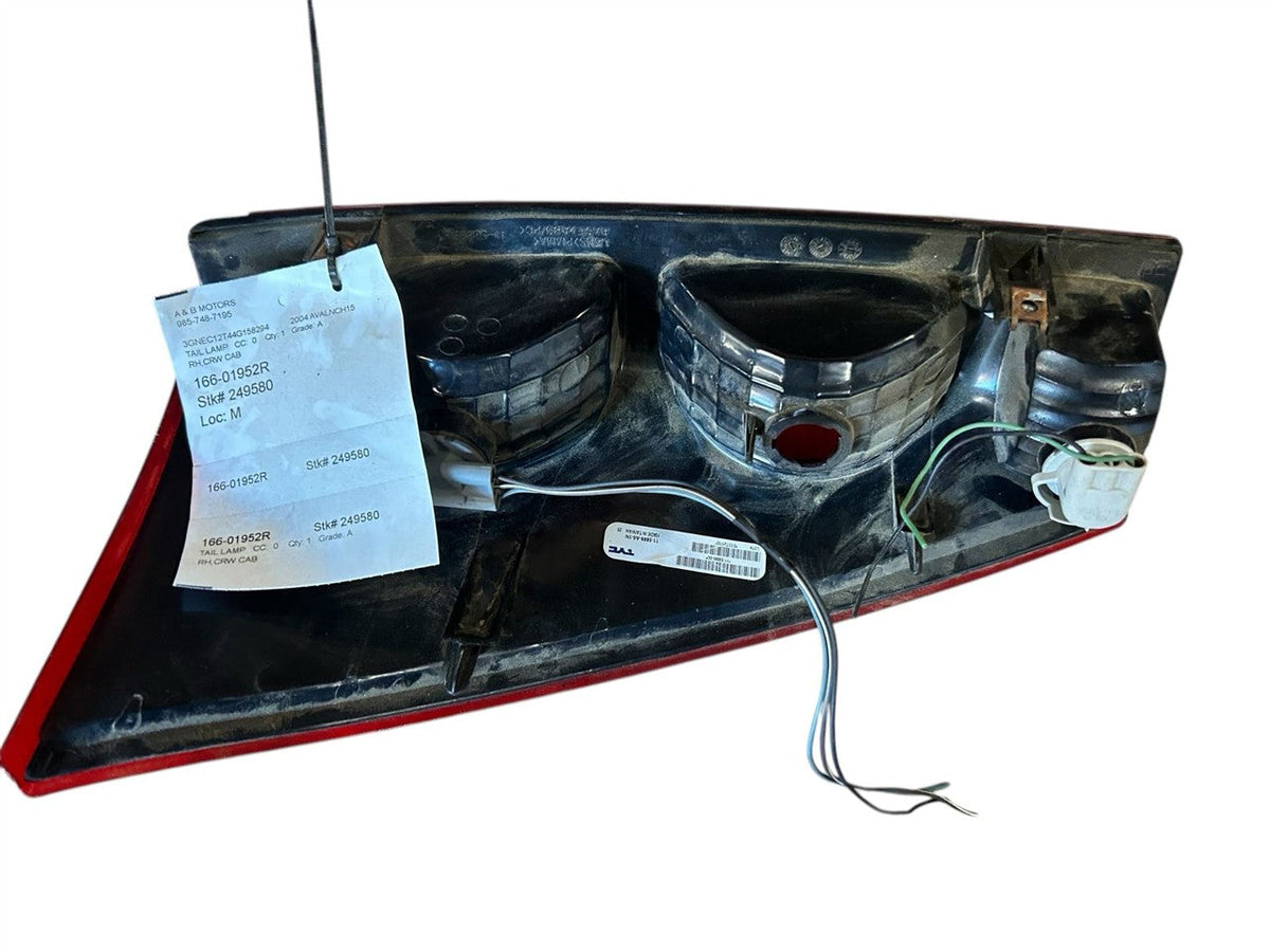 Tail Light from a 2004 Chevrolet Avalanche 1500, right side, photo 4