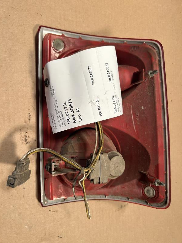 Tail Light from a 2005 Dodge Dakota, left side, photo 3