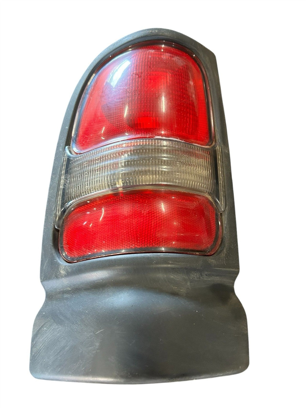 Tail Light from a 2001 Dodge Ram 1500, left side, photo 1