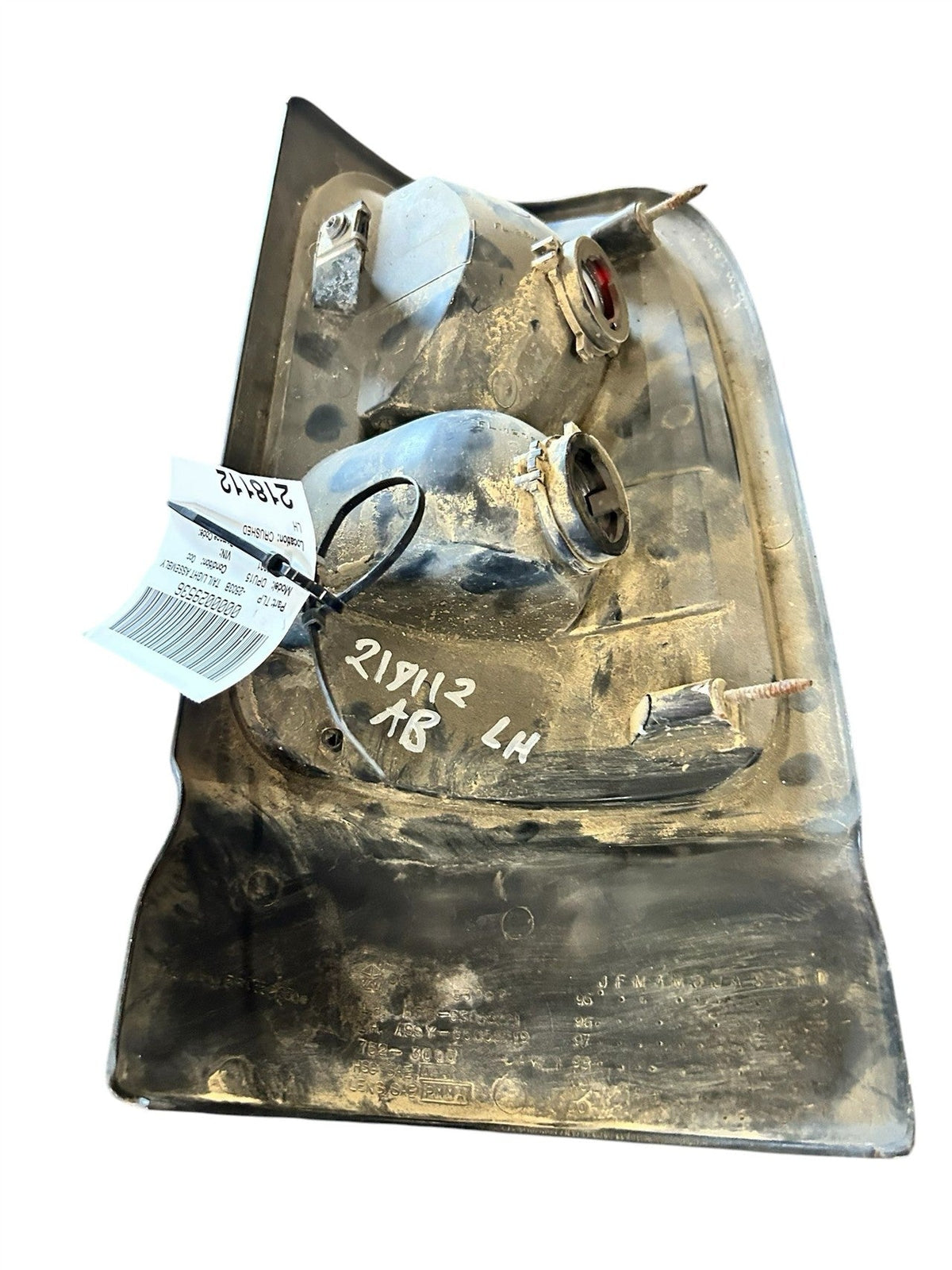 Tail Light from a 2001 Dodge Ram 1500, left side, photo 2