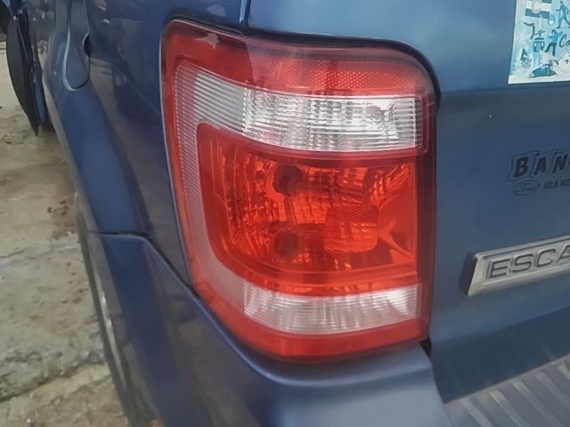 Tail Light from a 2010 Ford Escape, left side, photo 1