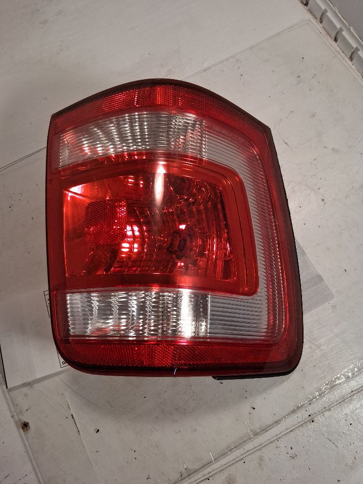 Tail Light from a 2010 Ford Escape, left side, photo 2