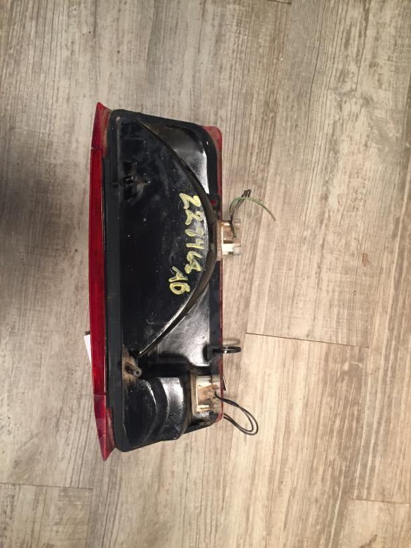 Tail Light from a 1995 Ford F-150, left side, photo 2