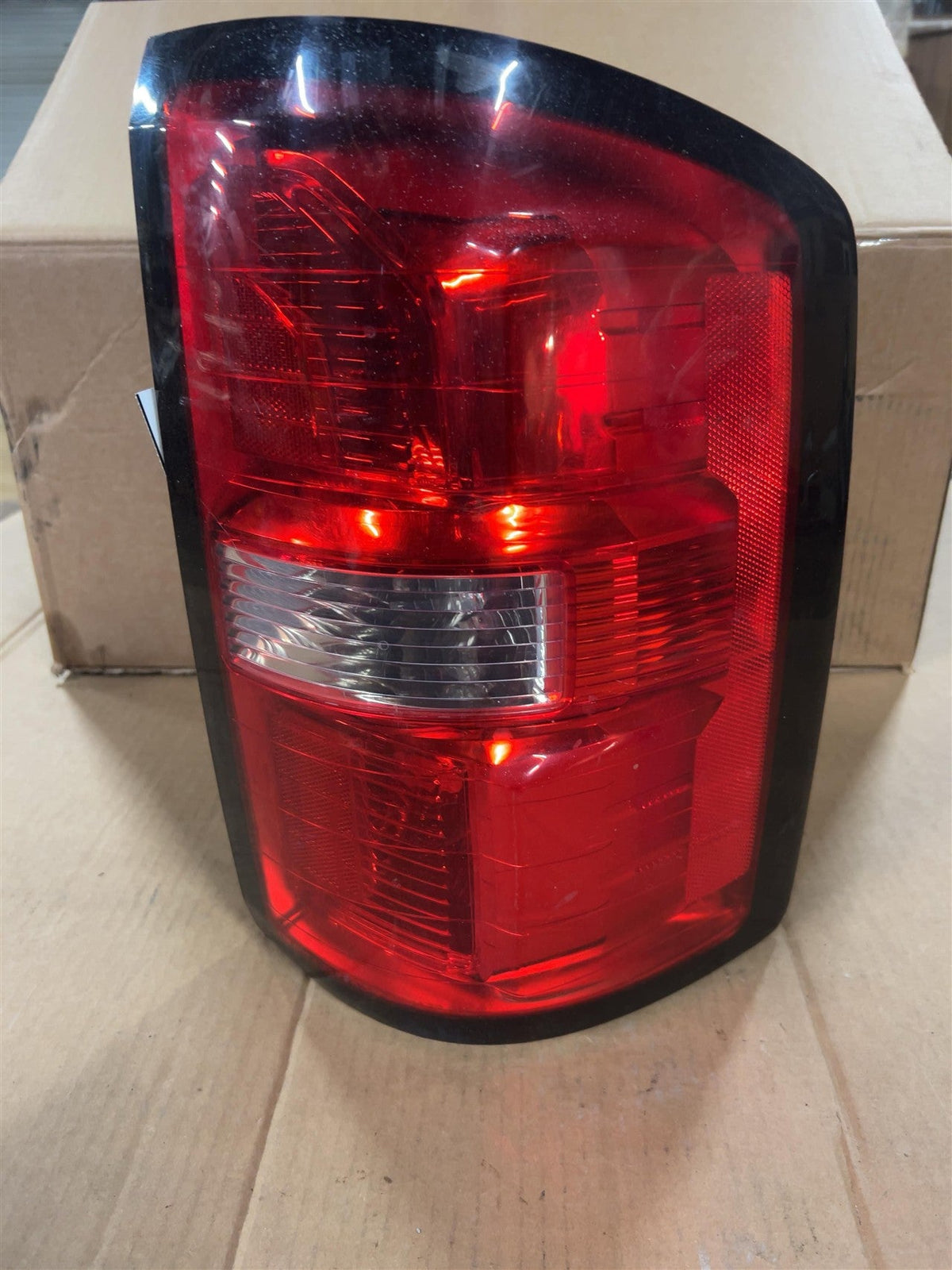 Tail Light from a 2015 GMC Sierra 1500, right side, photo 2