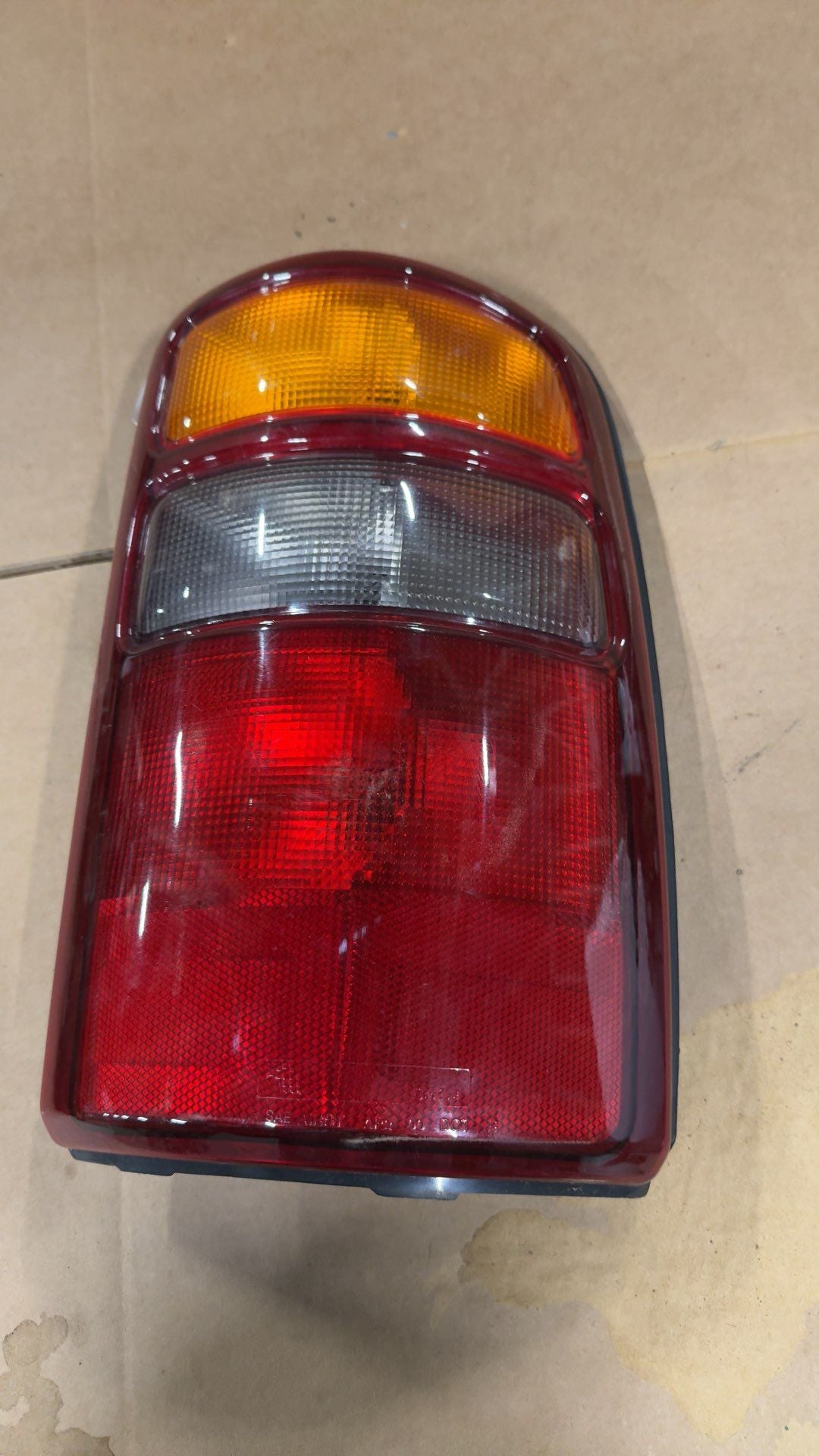 Tail Light from a 2002 GMC Yukon, right side, photo 3