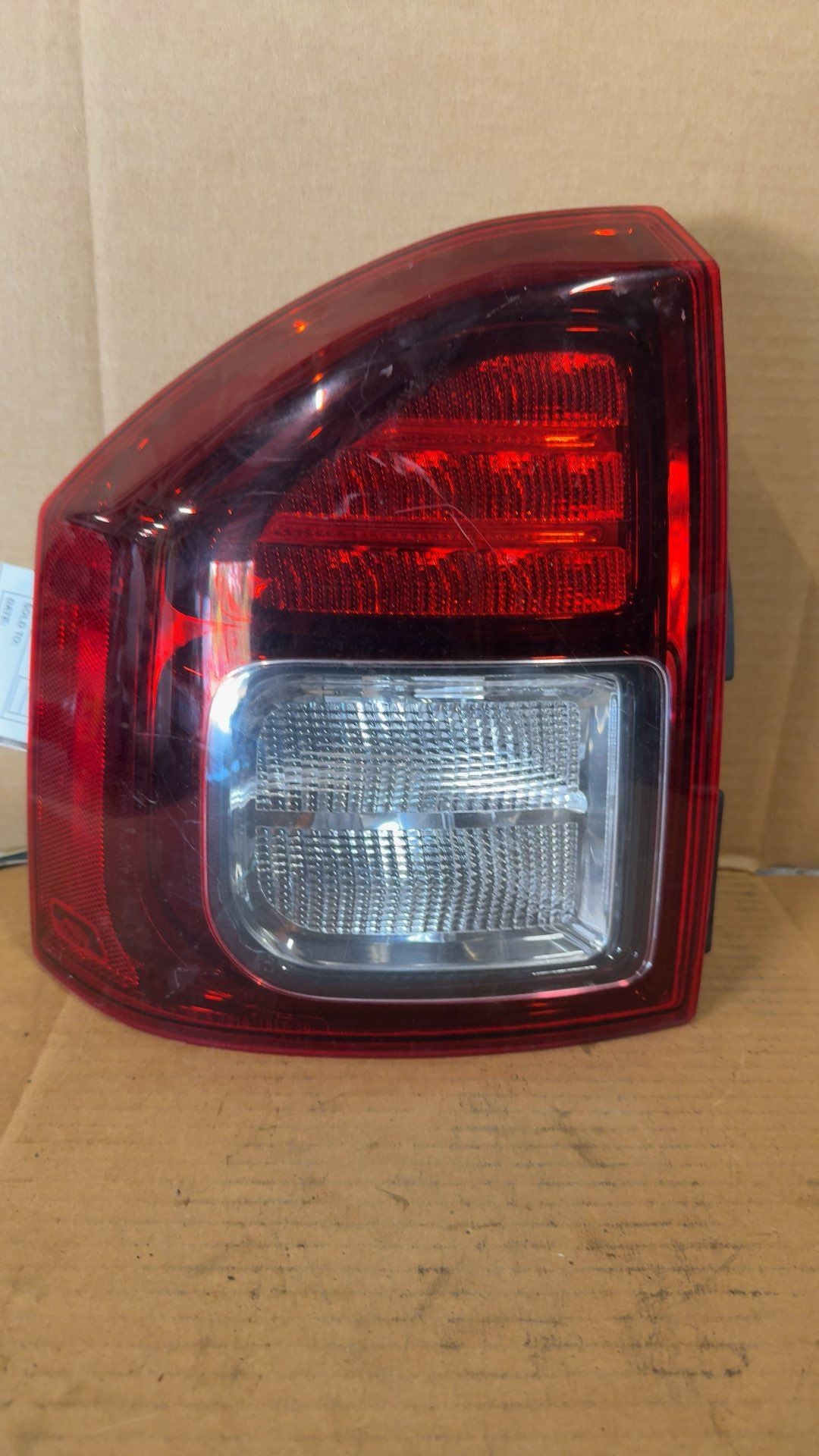 Tail Light from a 2014 Jeep Compass, left side, photo 1