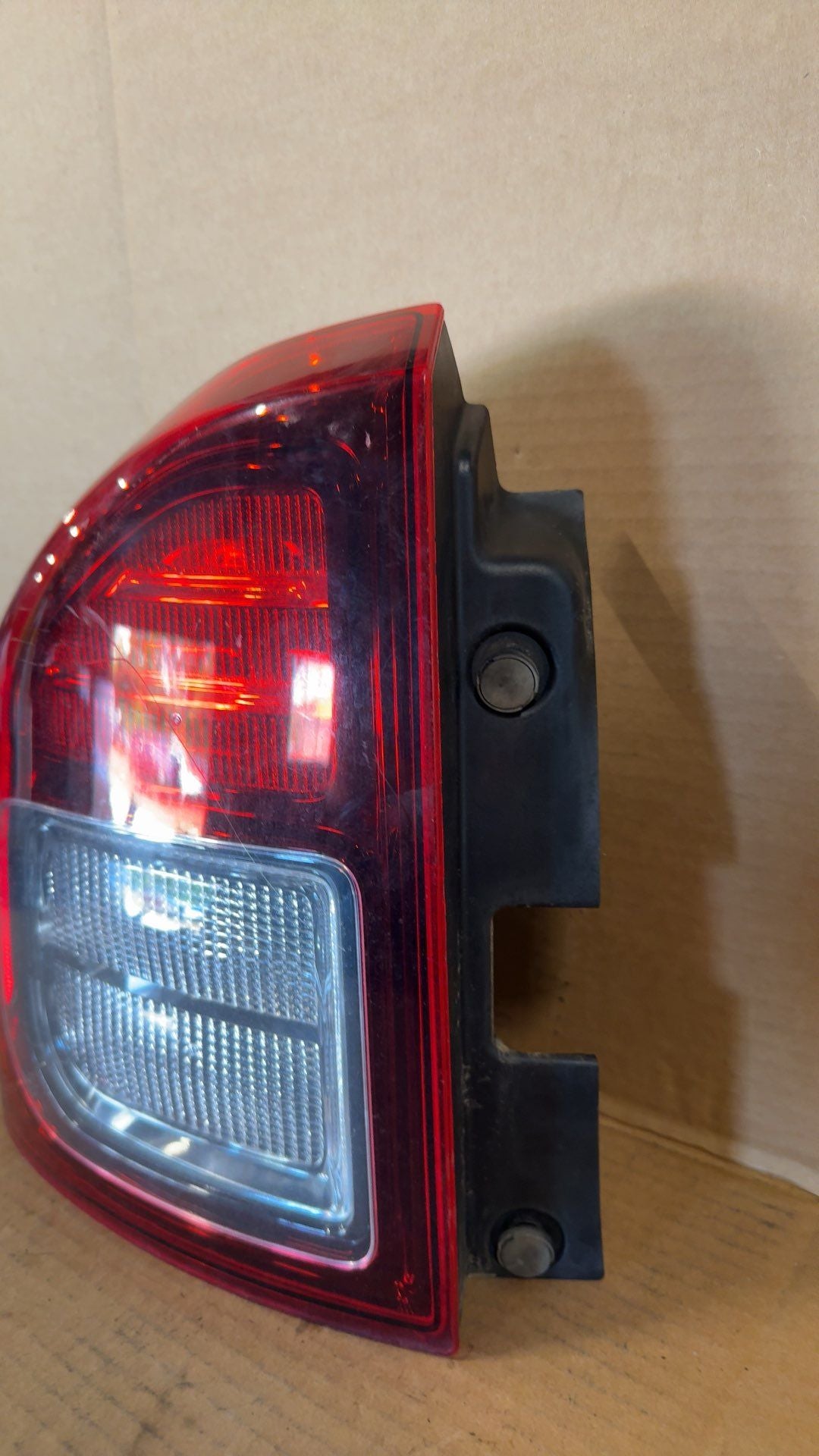 Tail Light from a 2014 Jeep Compass, left side, photo 3