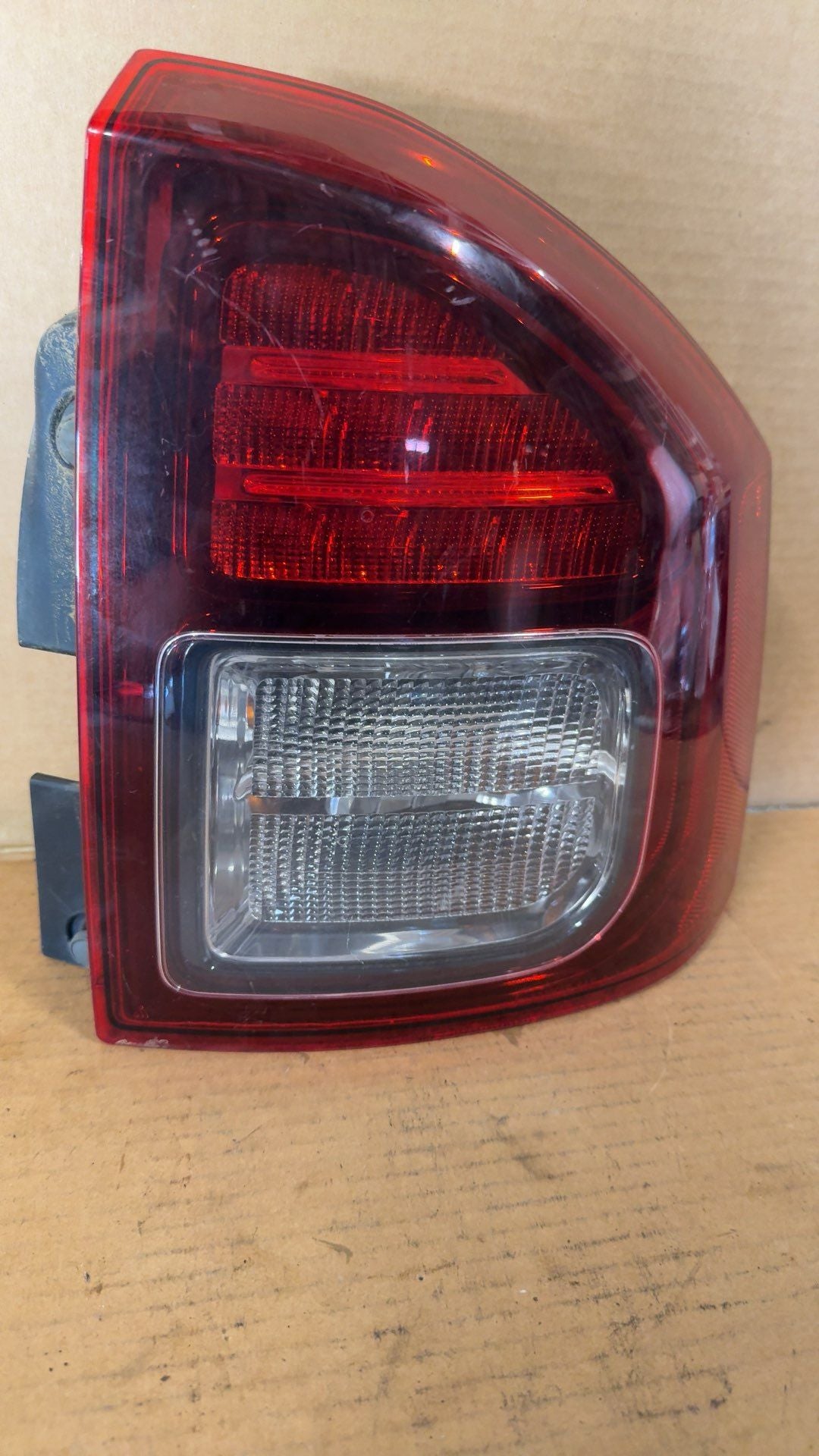 Tail Light from a 2014 Jeep Compass, right side, photo 1