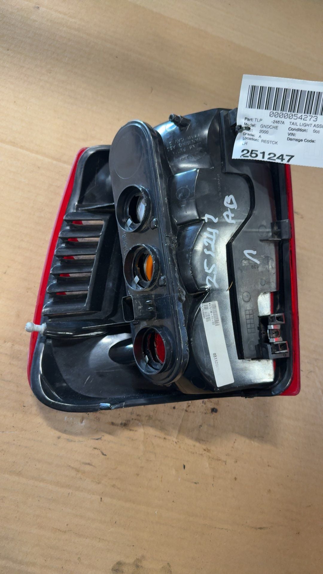 Tail Light from a 2000 Jeep Grand Cherokee, left side, photo 3