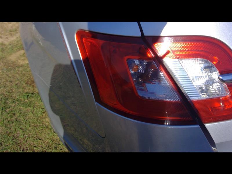 Tail Light from a 2010 Ford Taurus, left side, photo 1