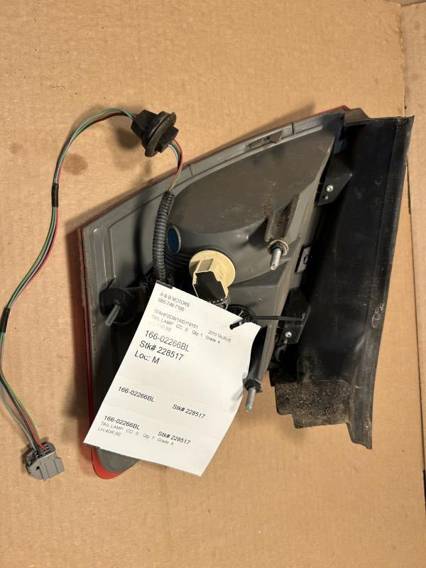 Tail Light from a 2010 Ford Taurus, left side, photo 3