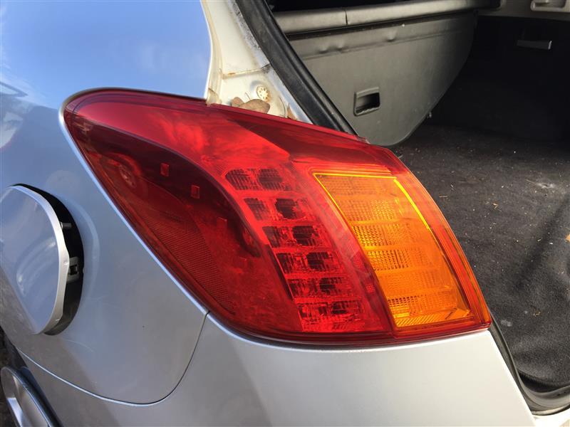 Tail Light from a 2009 Nissan Murano, left side, photo 1