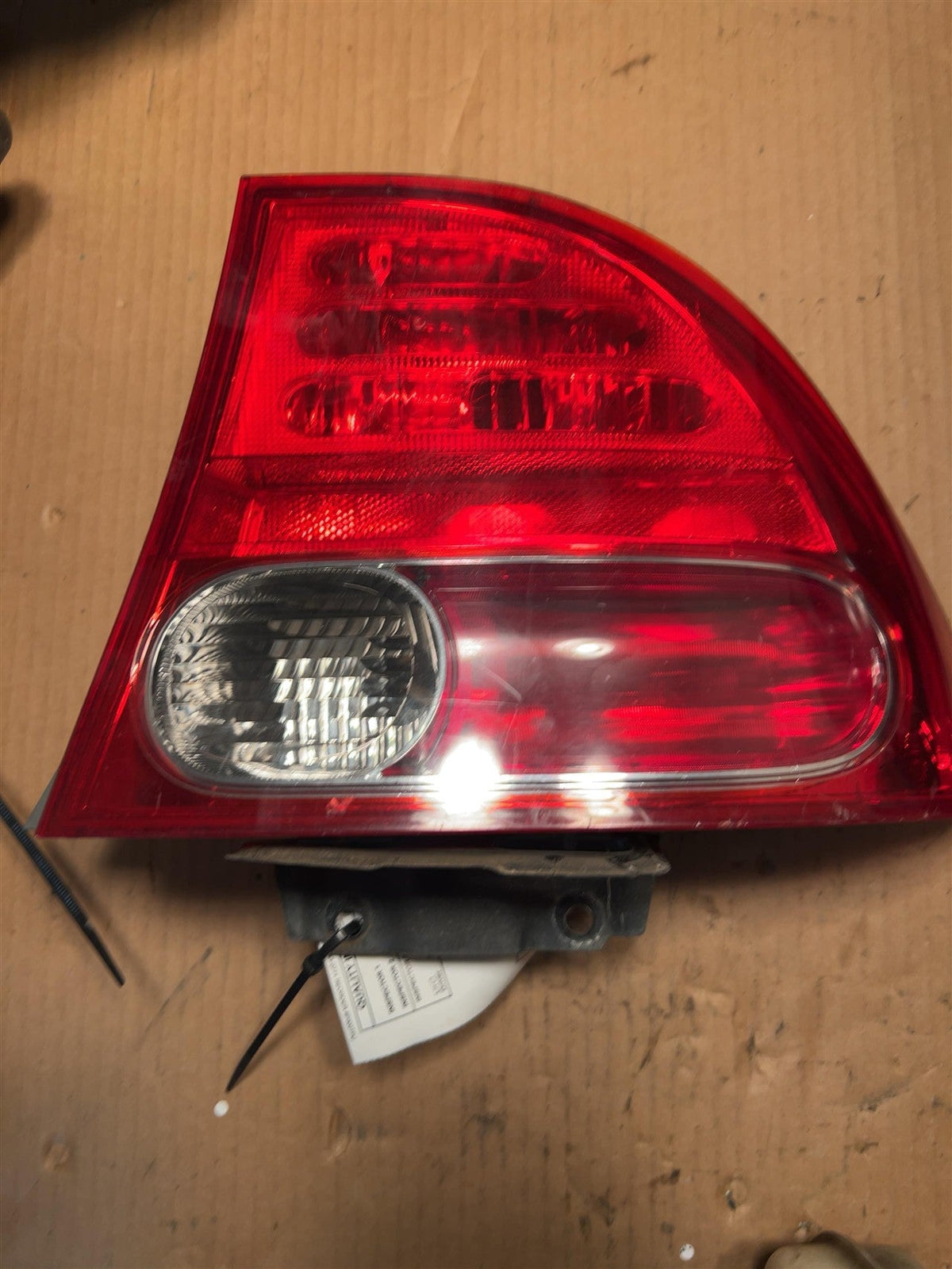 Tail Light from a 2007 Honda, right side, photo 2