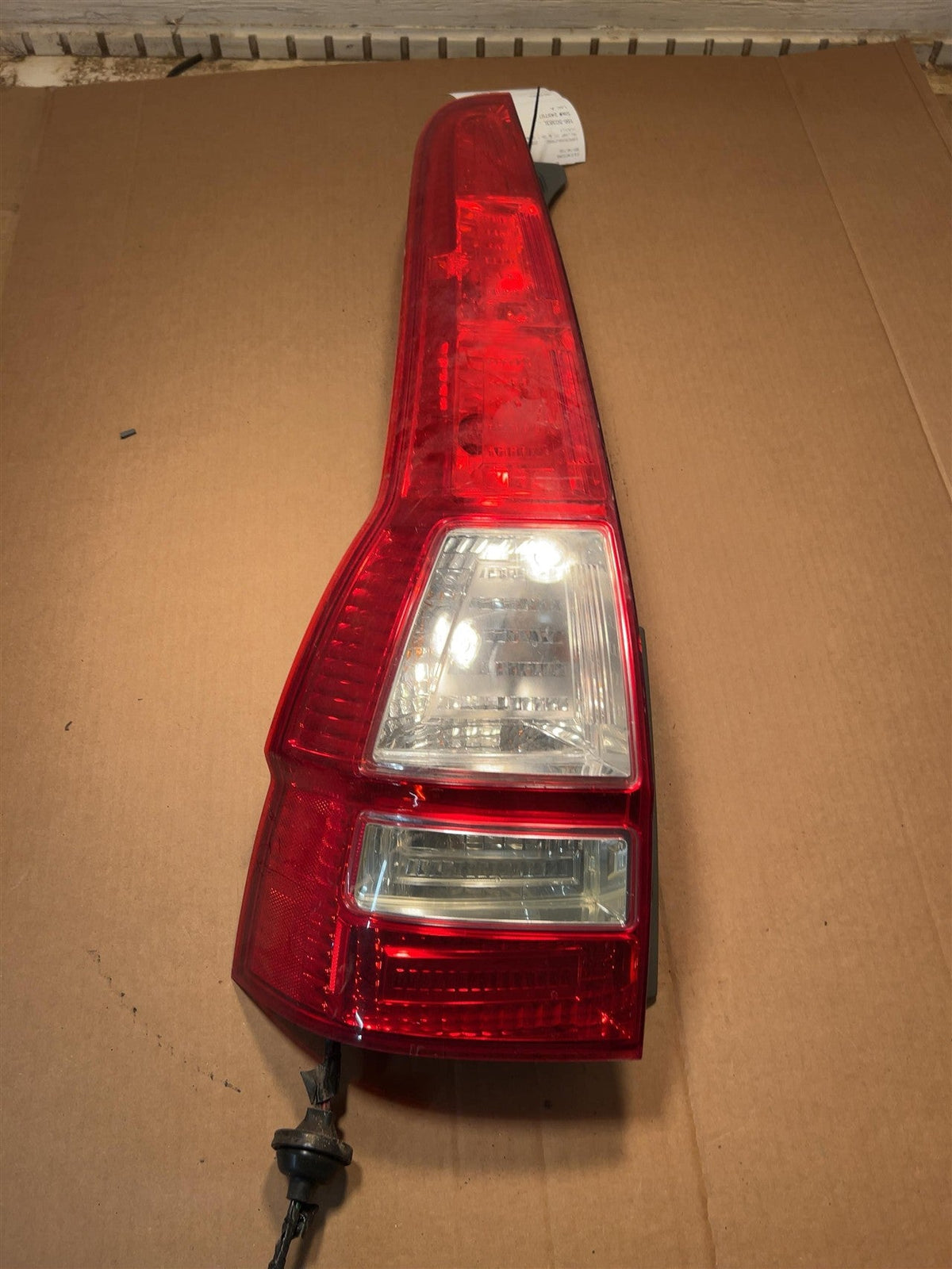 Tail Light from a 2009 Honda CR-V, left side, photo 3