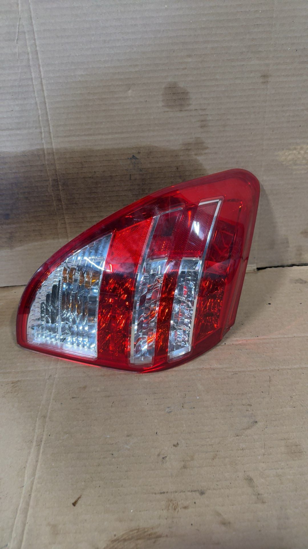 Tail Light from a 2009 Toyota RAV4, left side, photo 1