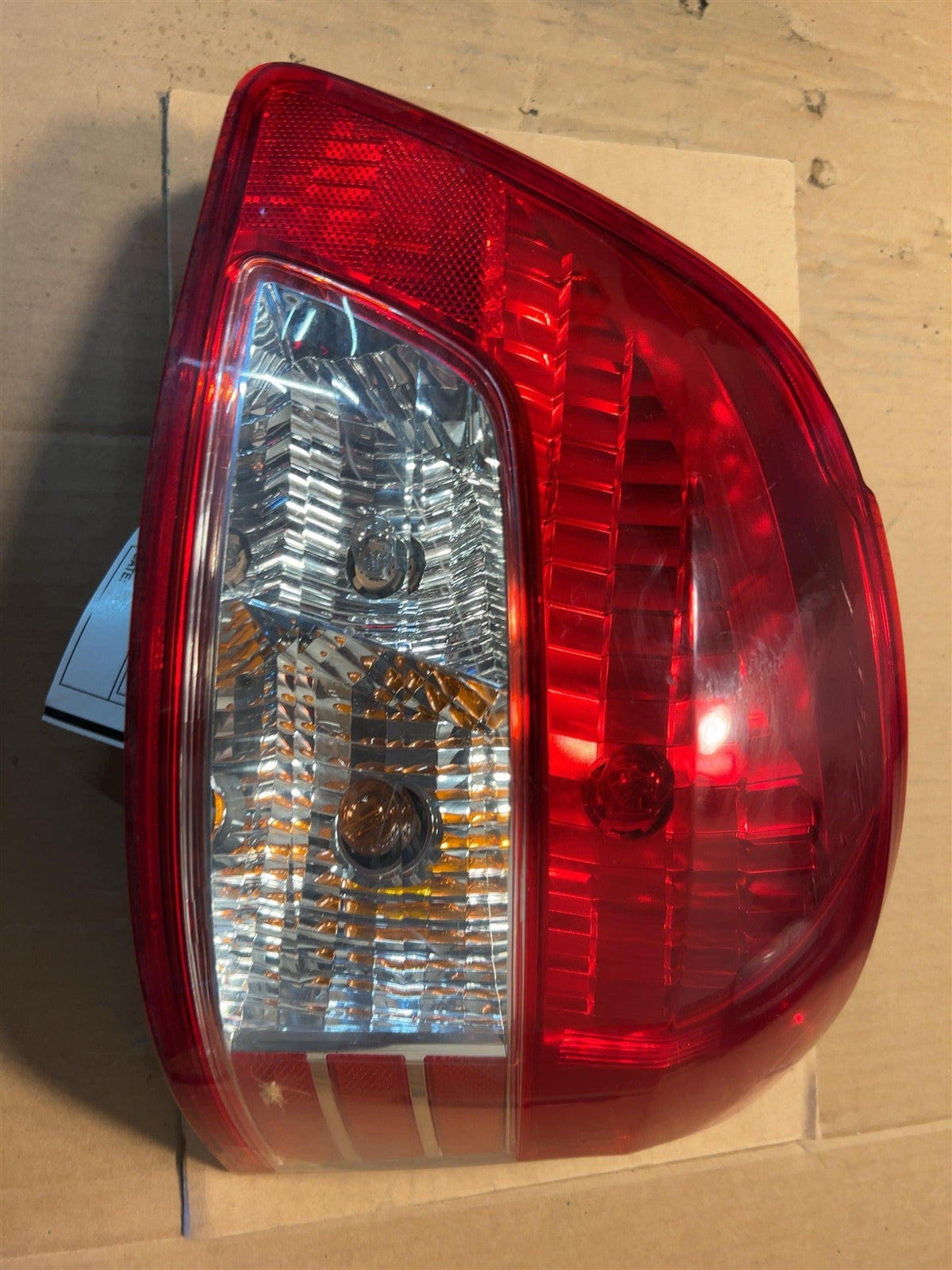 Tail Light from a 2012 Toyota Yaris, right side, photo 2
