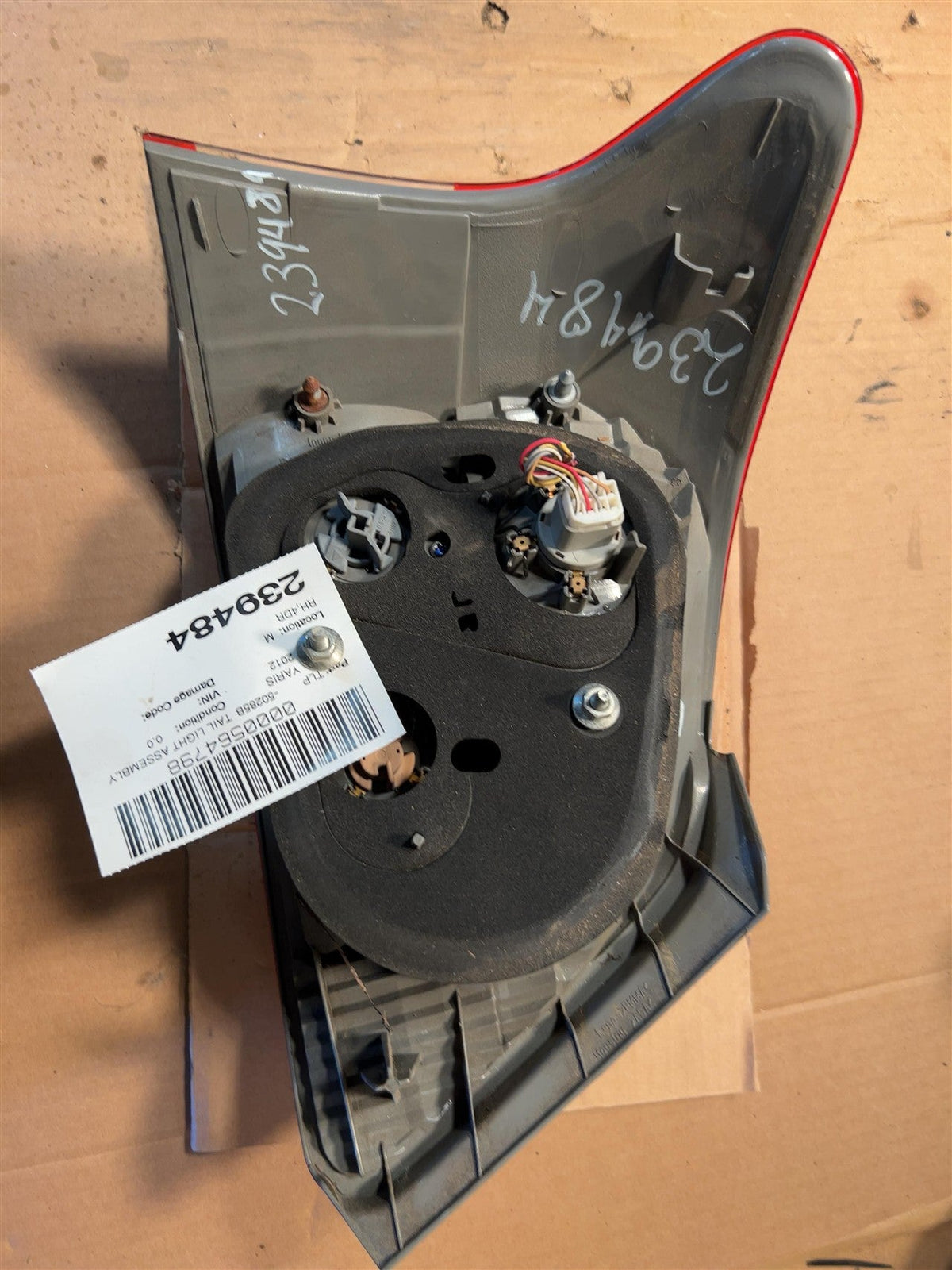Tail Light from a 2012 Toyota Yaris, right side, photo 3