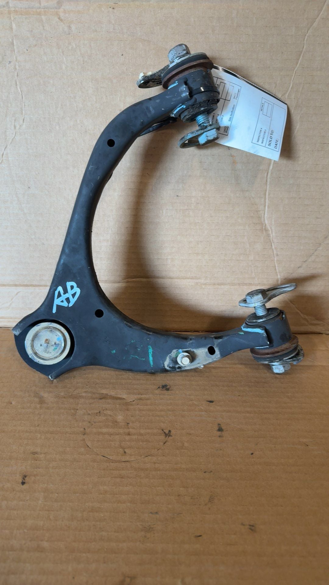 Upper Control Arm from a 2019 Chevrolet Tahoe, front, left side, photo 1