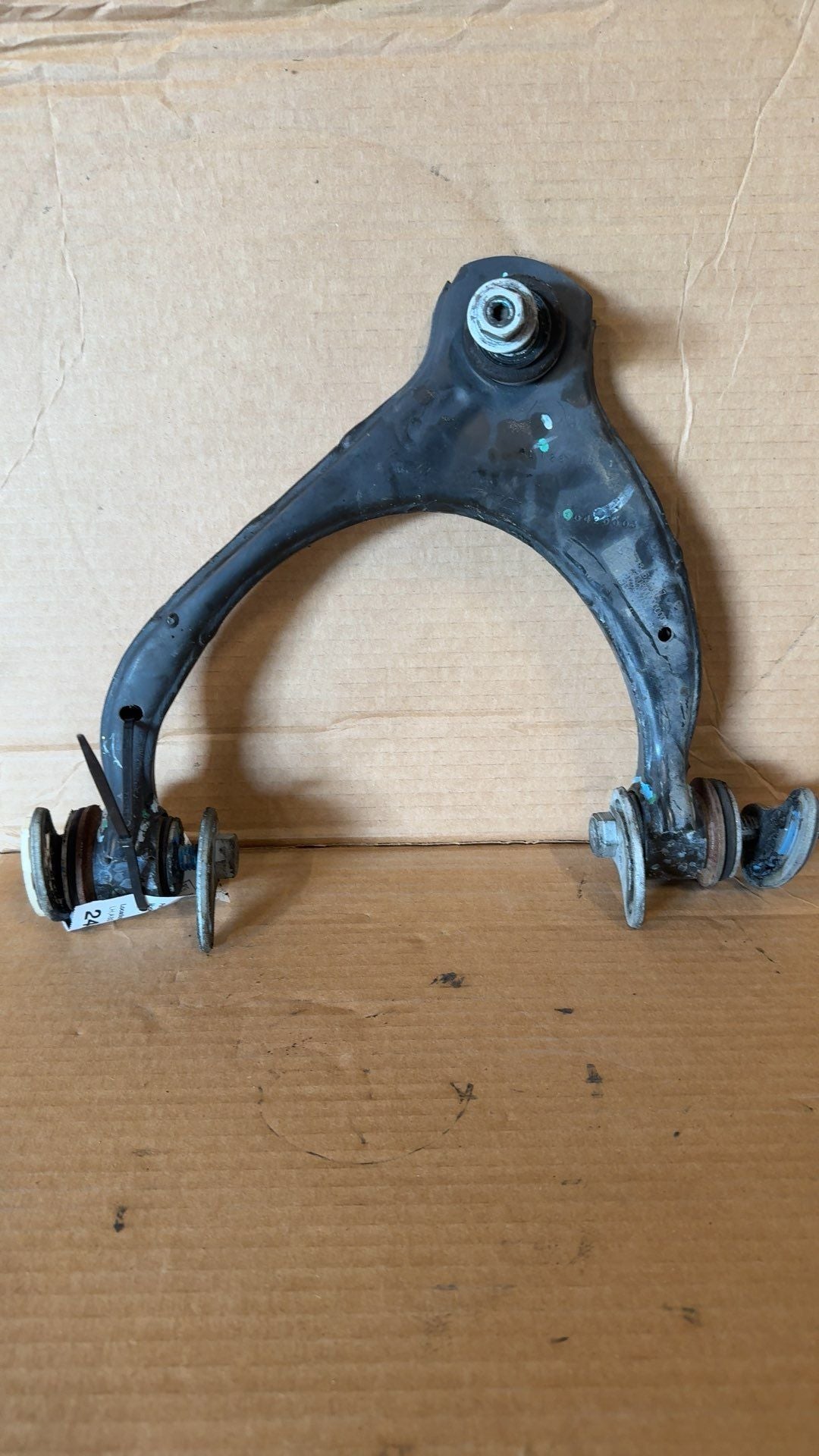 Upper Control Arm from a 2019 Chevrolet Tahoe, front, left side, photo 2