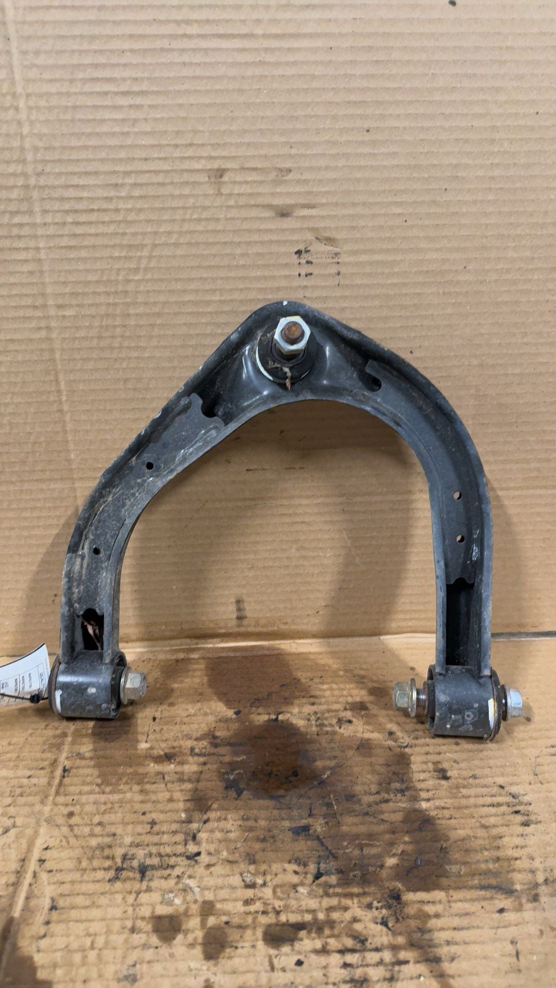 Upper Control Arm from a 2020 Nissan Titan, front, right side, photo 2