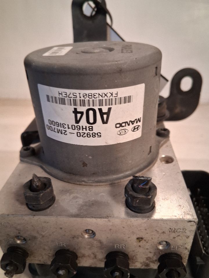 ABS Pump Module from a 2011 Hyundai Genesis, photo 4