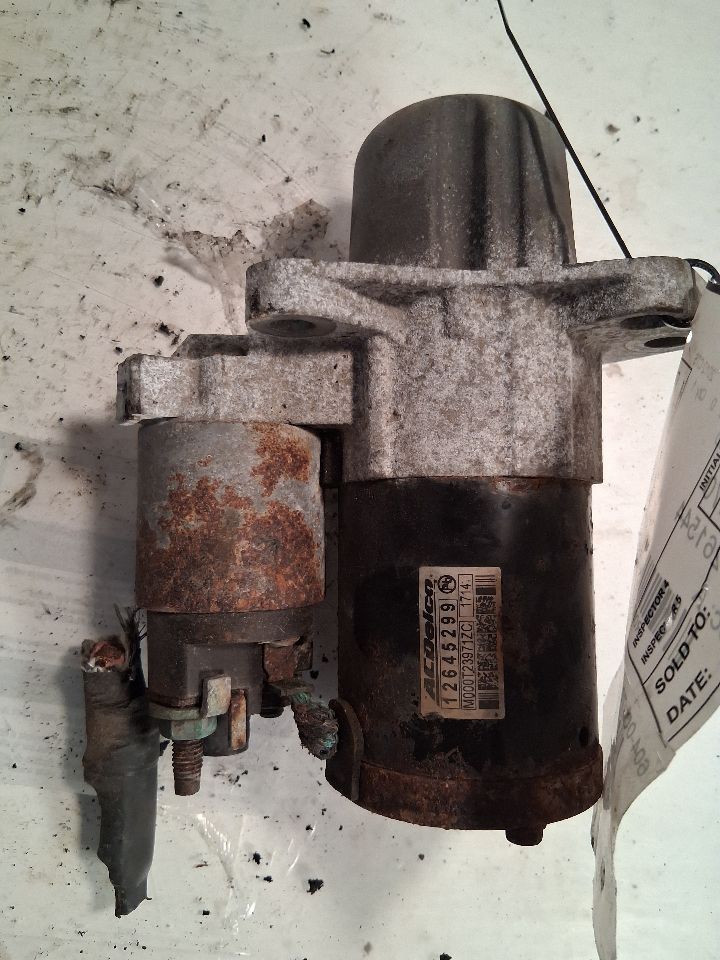 Starter Motor from a 2012 Cadillac CTS, photo 1