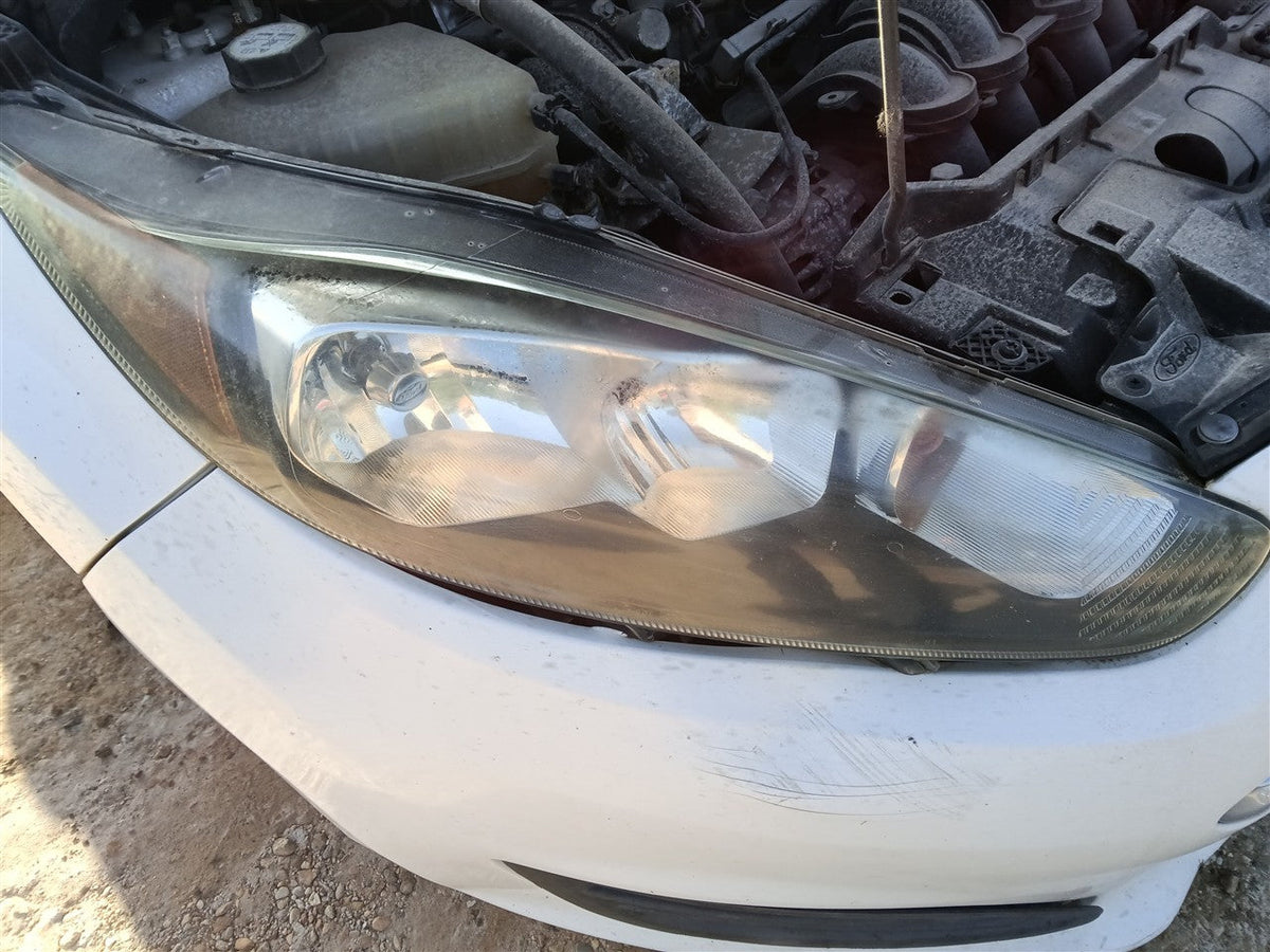 Headlight Assembly from a 2014 Ford Fiesta, right side, photo 1