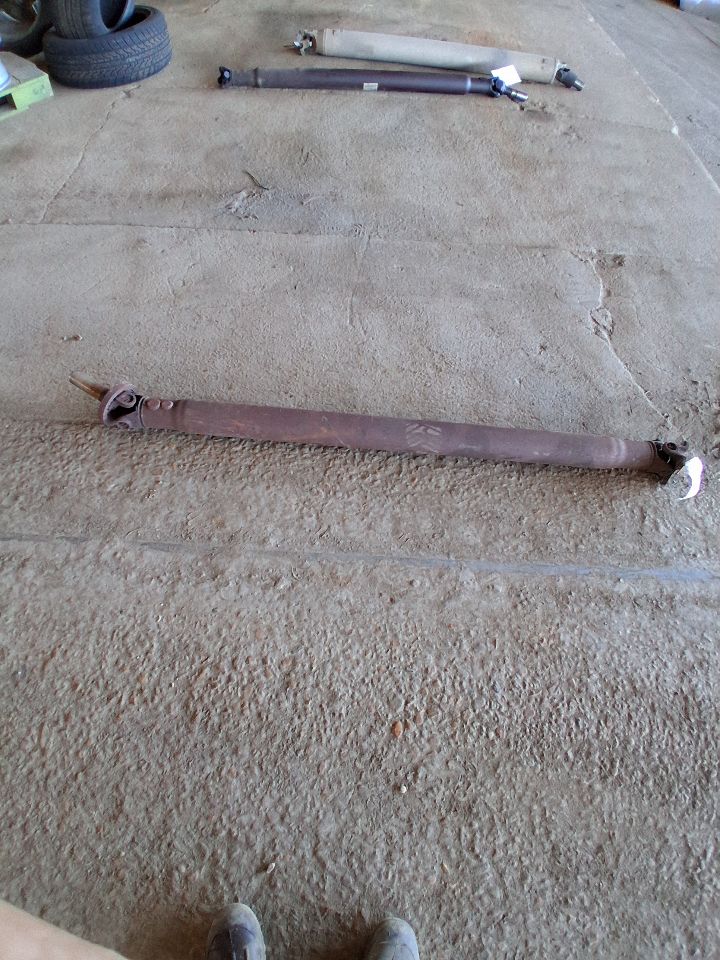 Drive Shaft from a 2001 Mercury Grand Marquis, rear, photo 1