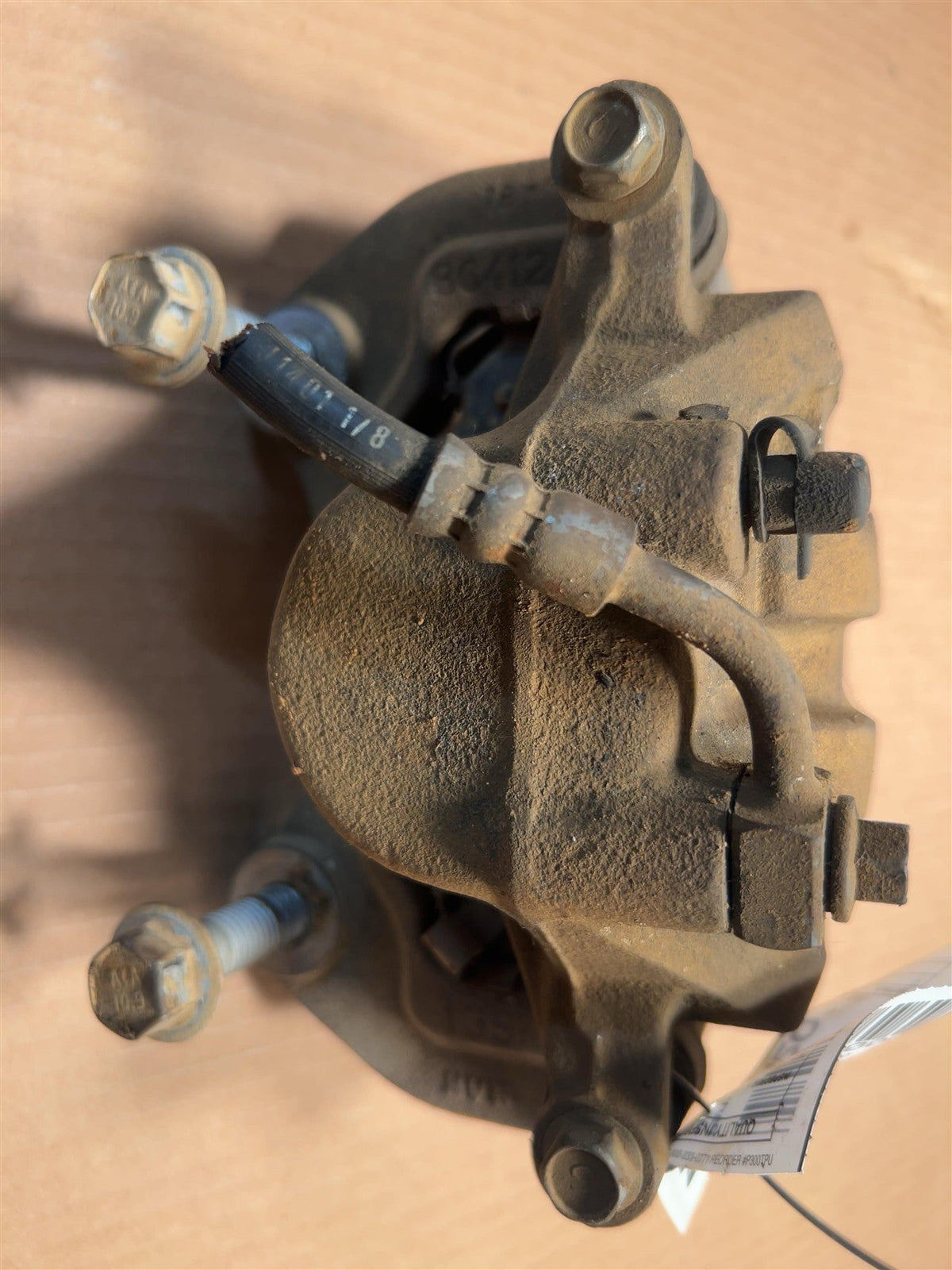 Brake Caliper from a 2011 Chevrolet Camaro, front, right side, photo 1