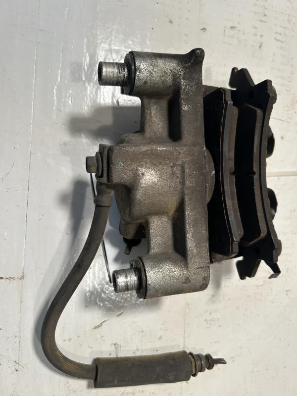 Brake Caliper from a 2002 Chevrolet Cavalier, front, left side, photo 1