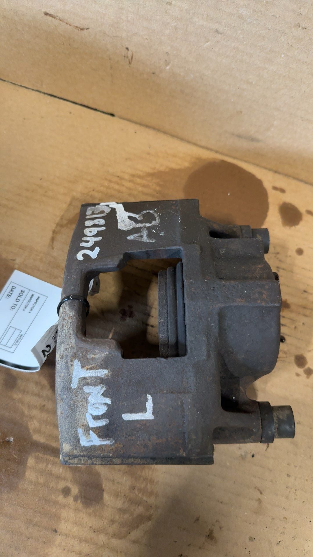 Brake Caliper from a 1998 GMC 1500, front, left side, photo 1