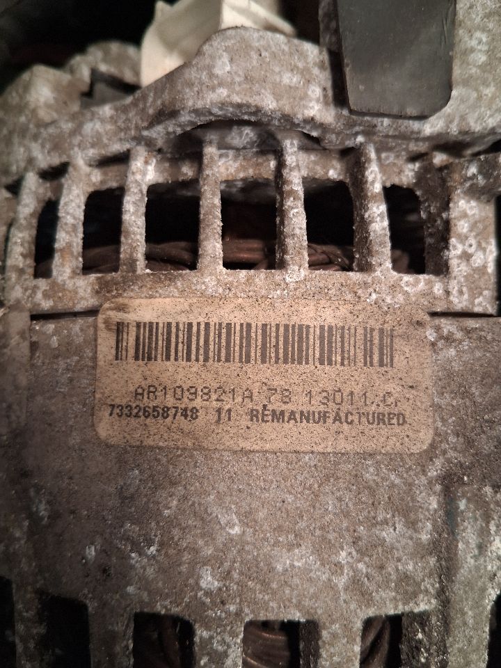 Alternator from a 2006 Ford Focus, photo 1