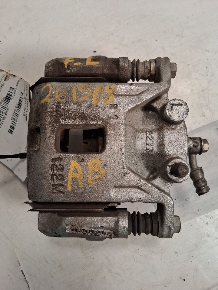 Brake Caliper from a 2022 Nissan Versa, front, left side, photo 2