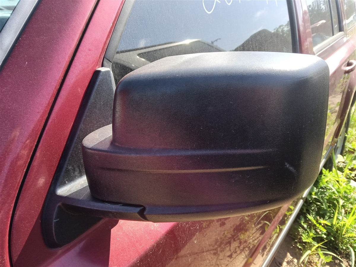Side View Mirror from a 2016 Jeep Patriot, left side, photo 1