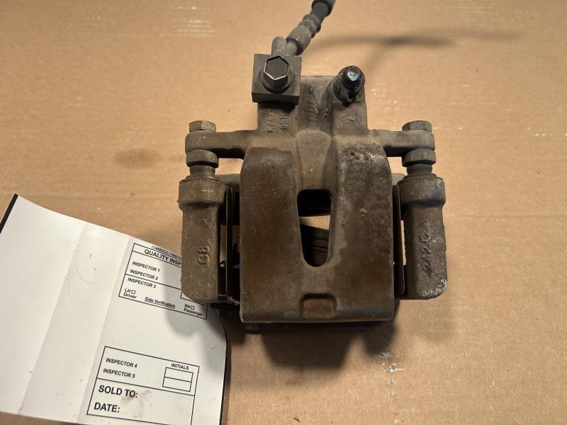 Brake Caliper from a 2005 Dodge Magnum, rear, left side, photo 2