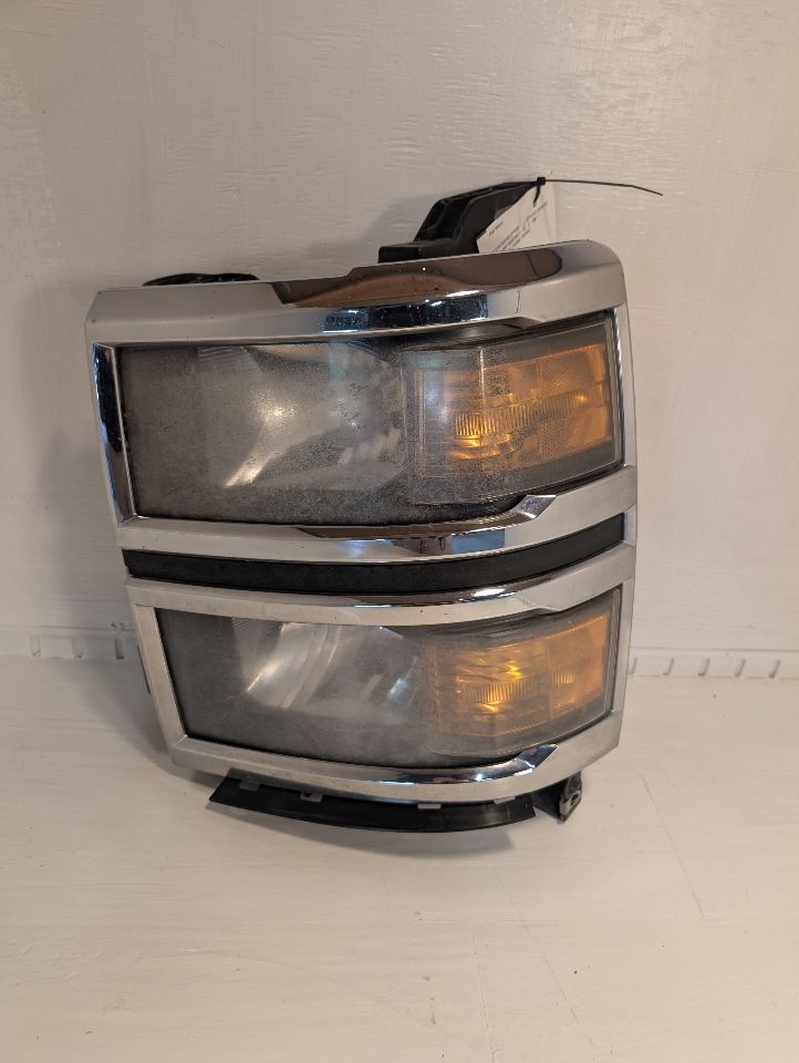 Headlight Assembly from a 2014 Chevrolet Silverado 1500, left side, photo 2