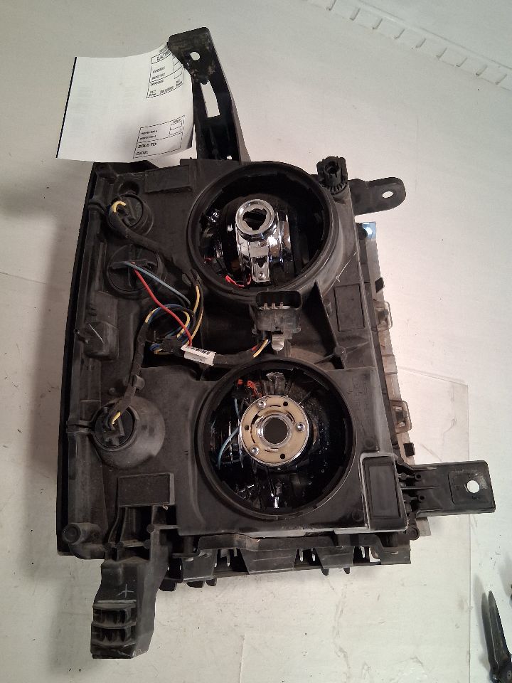 Headlight Assembly from a 2014 Chevrolet Silverado 1500, left side, photo 11