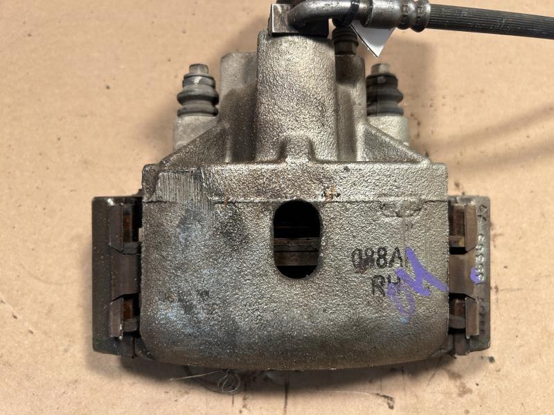 Brake Caliper from a 2012 Ram 1500, front, right side, photo 1