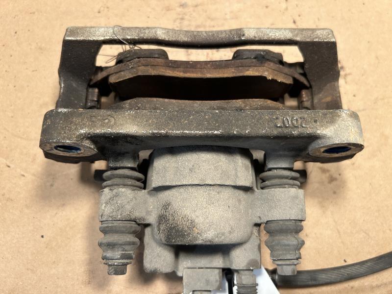 Brake Caliper from a 2012 Ram 1500, front, right side, photo 2