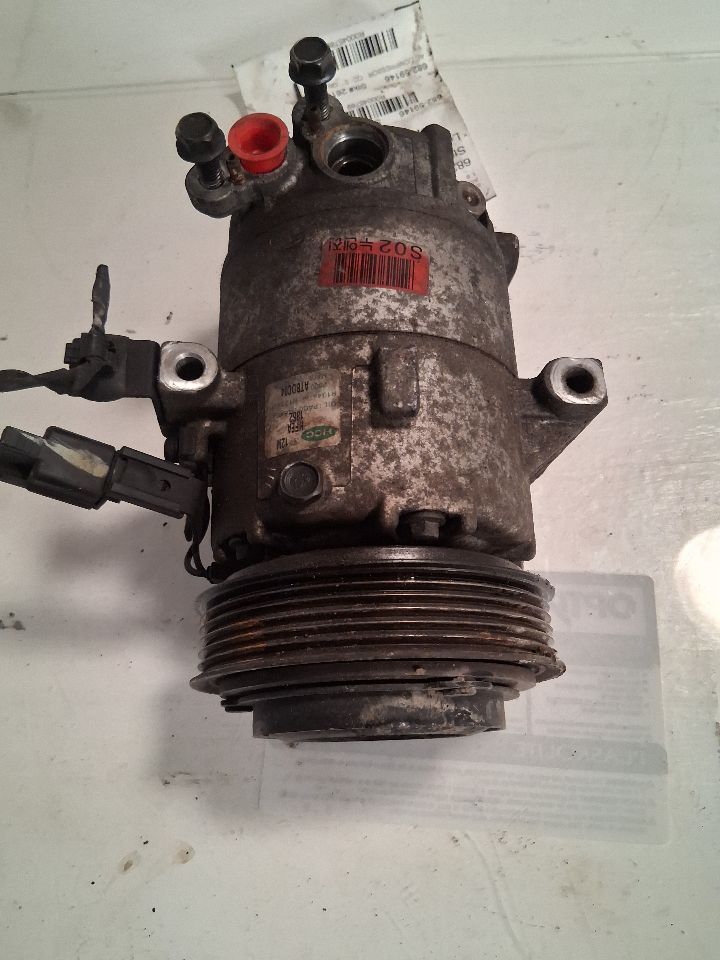 AC Compressor from a 2013 Hyundai Elantra, photo 1