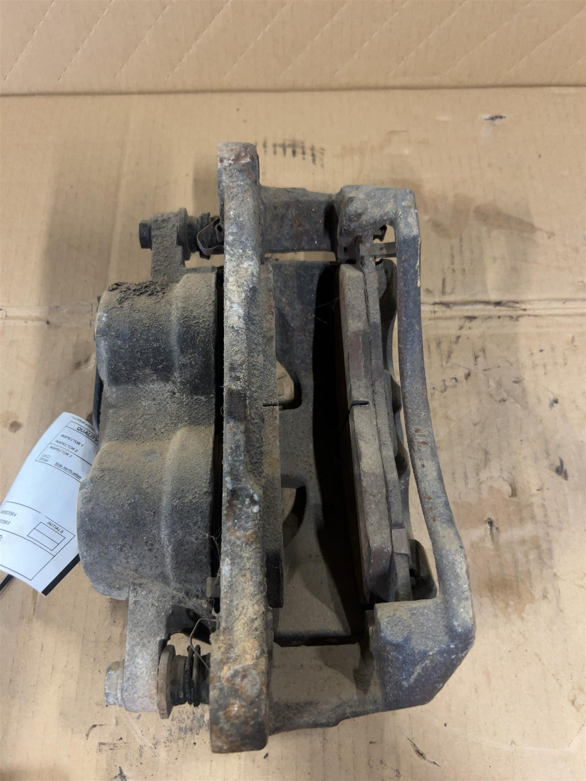 Brake Caliper from a 2011 Ram 2500, front, left side, photo 1