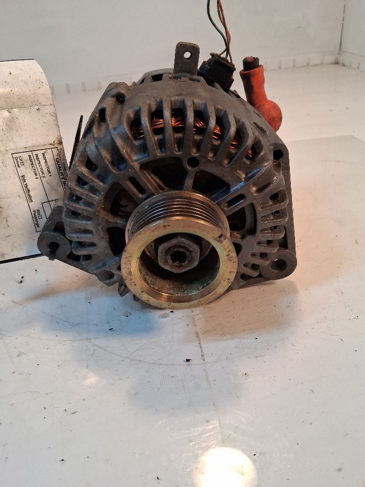 Alternator from a 2008 Nissan Pathfinder, photo 1
