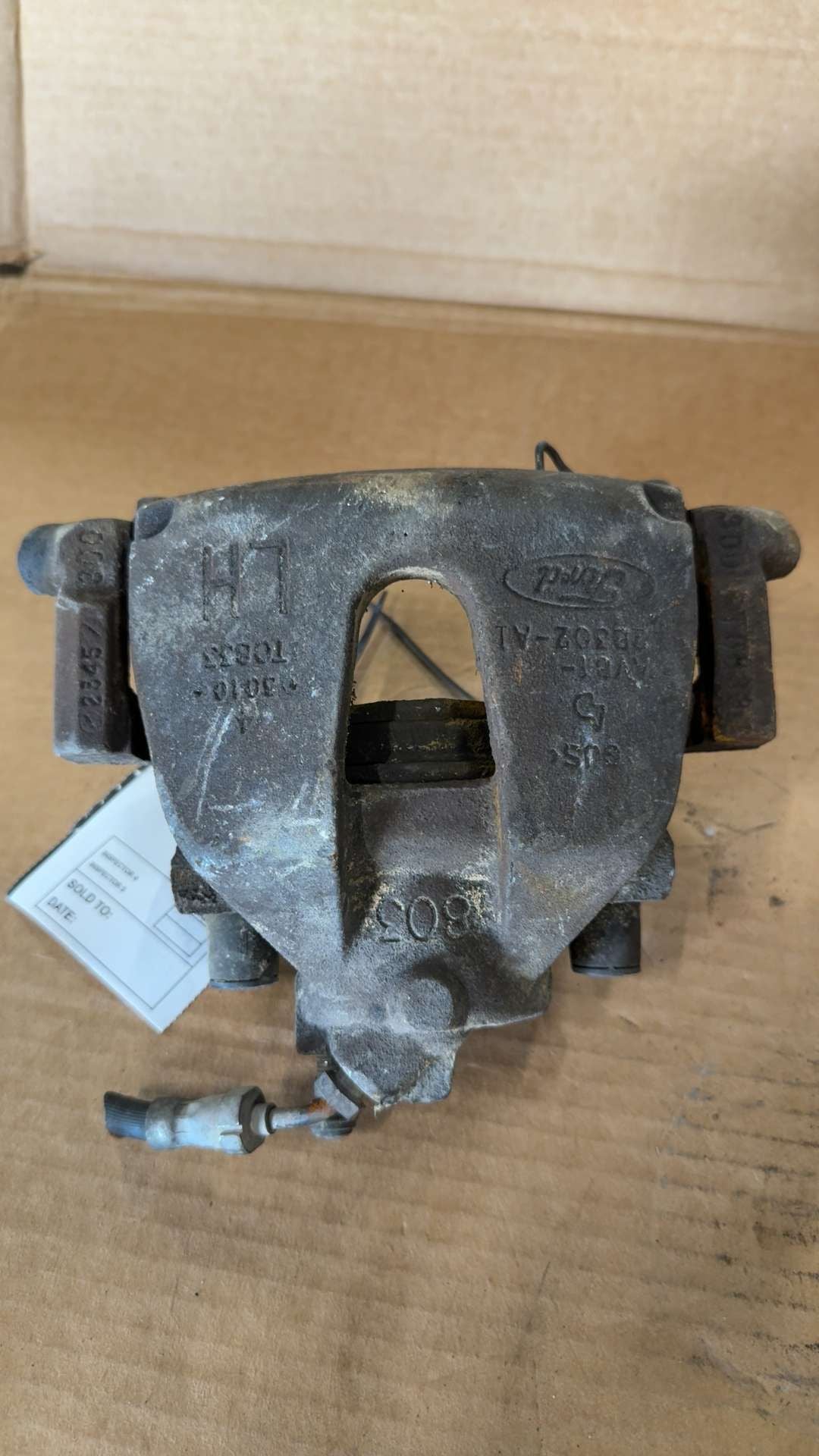 Brake Caliper from a 2013 Ford Escape, front, left side, photo 1