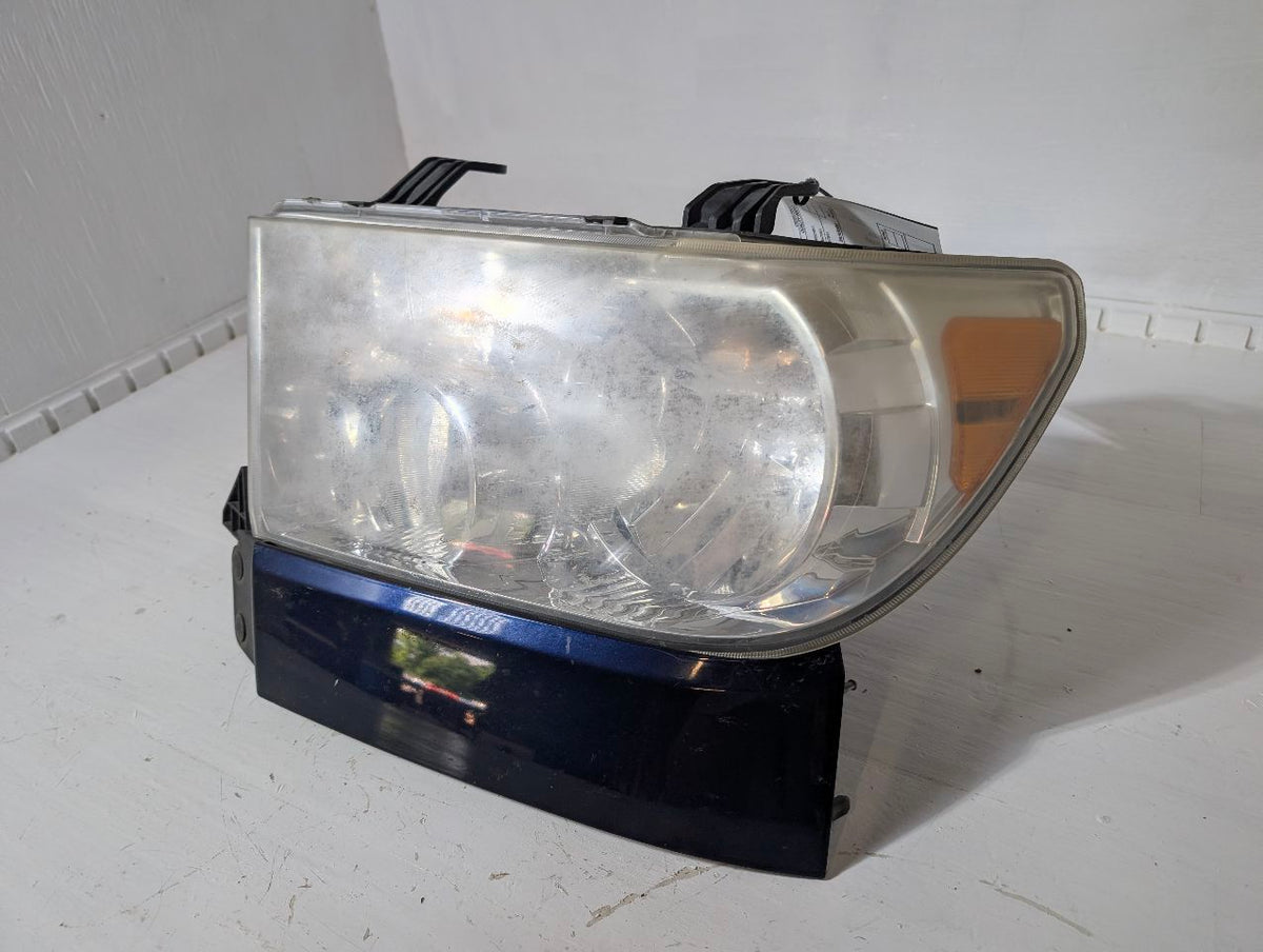 Headlight Assembly from a 2010 Toyota Tundra, left side, photo 2
