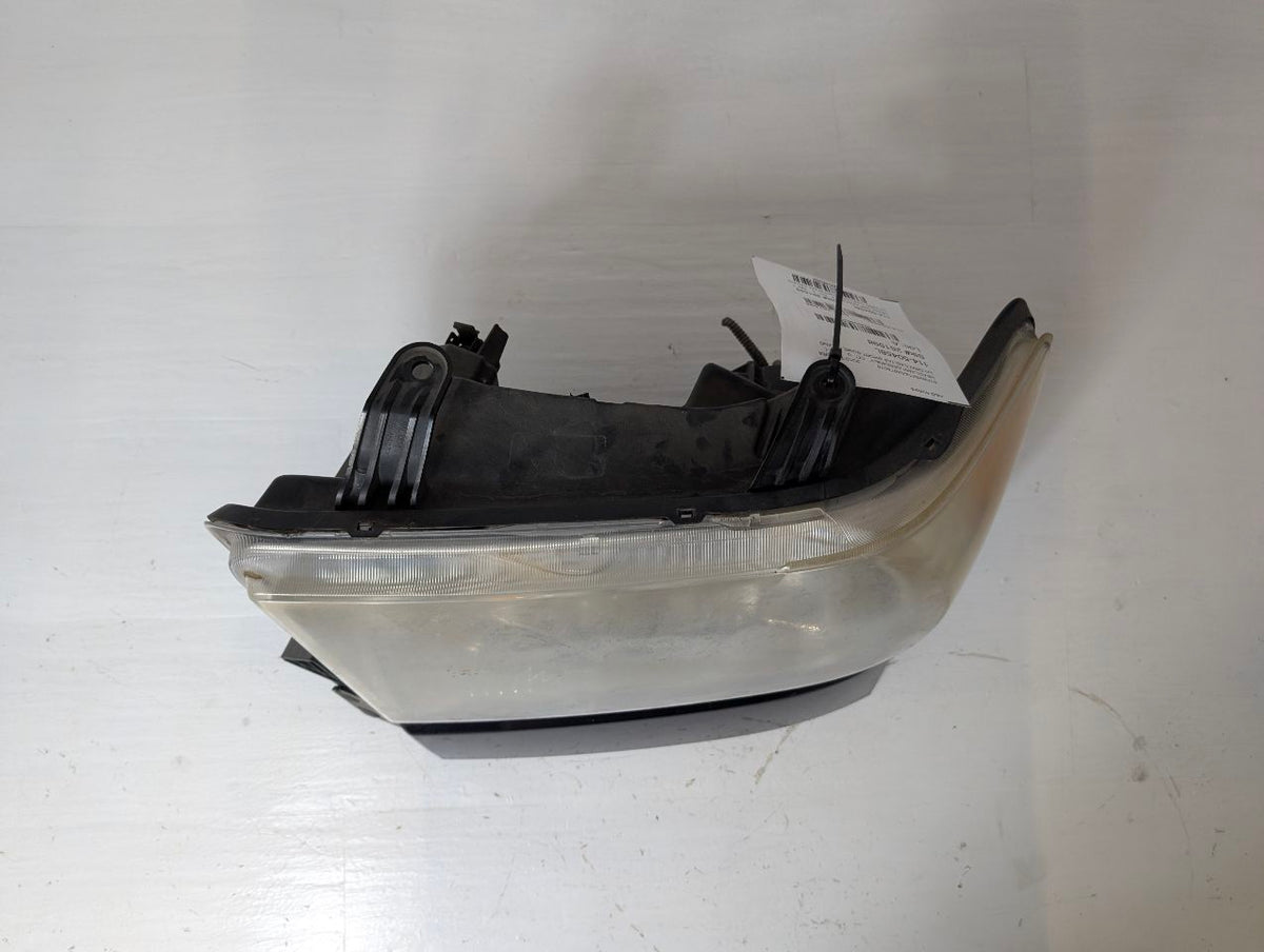 Headlight Assembly from a 2010 Toyota Tundra, left side, photo 3