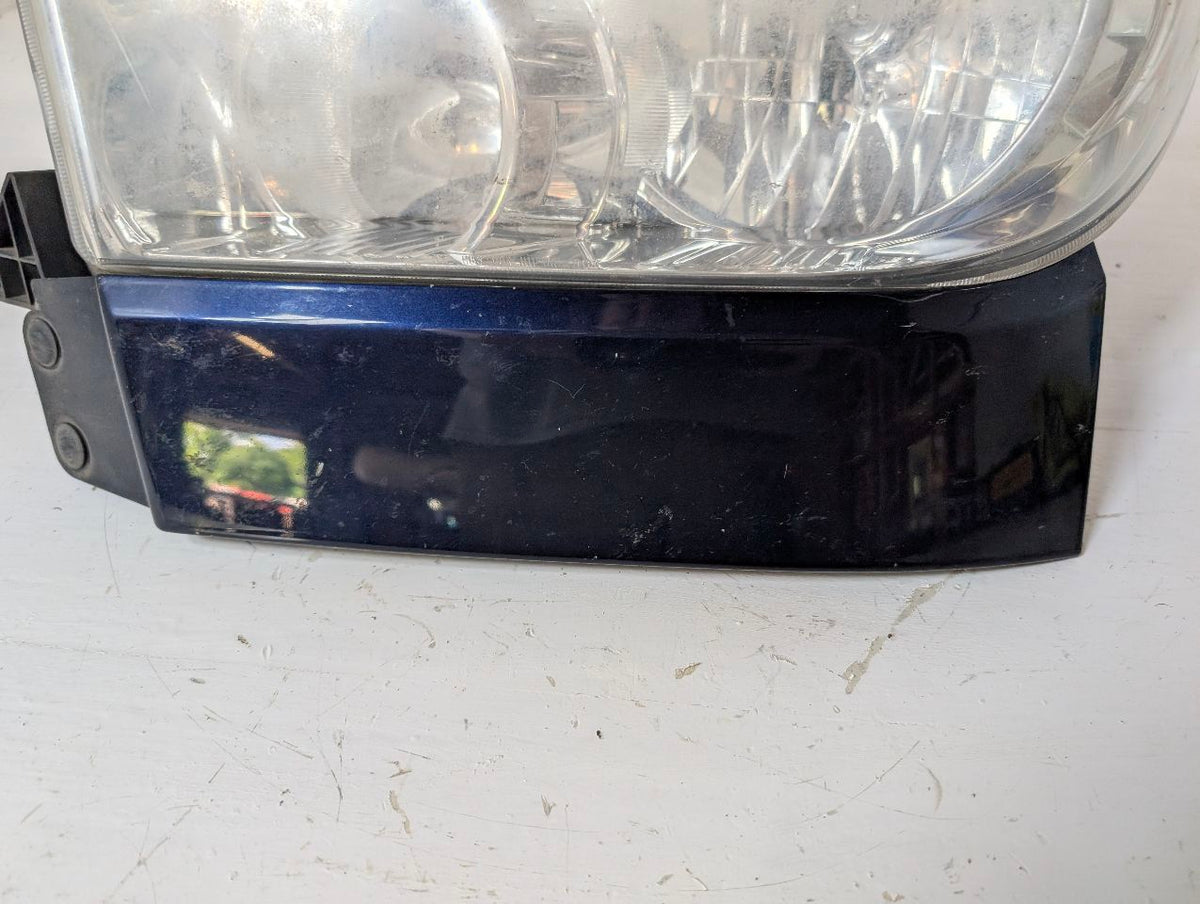 Headlight Assembly from a 2010 Toyota Tundra, left side, photo 4
